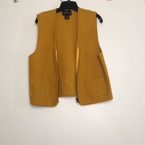 Sleeveless, zip up sweater